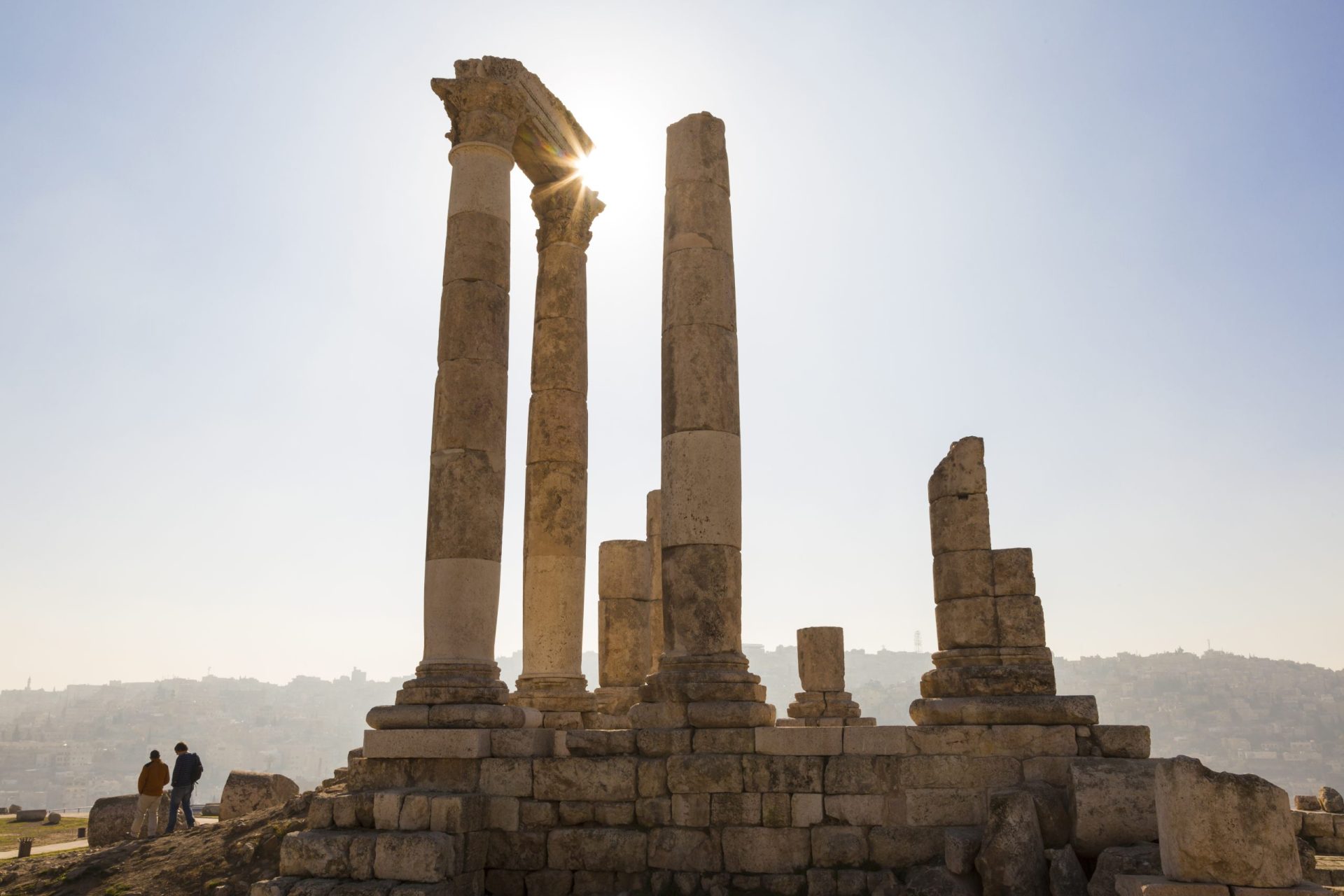 Exploring Ancient Ruins in Jerash, Jordan: Temple Architrave Fragments and Columns with Private Jordan Tours